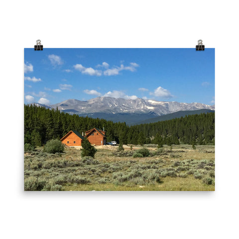 Wood home against pine trees and mountains - Print